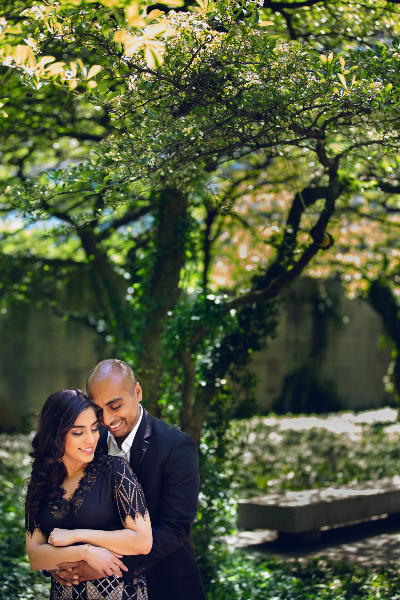 Engagement photo of a happy couple by Astrapia Photography